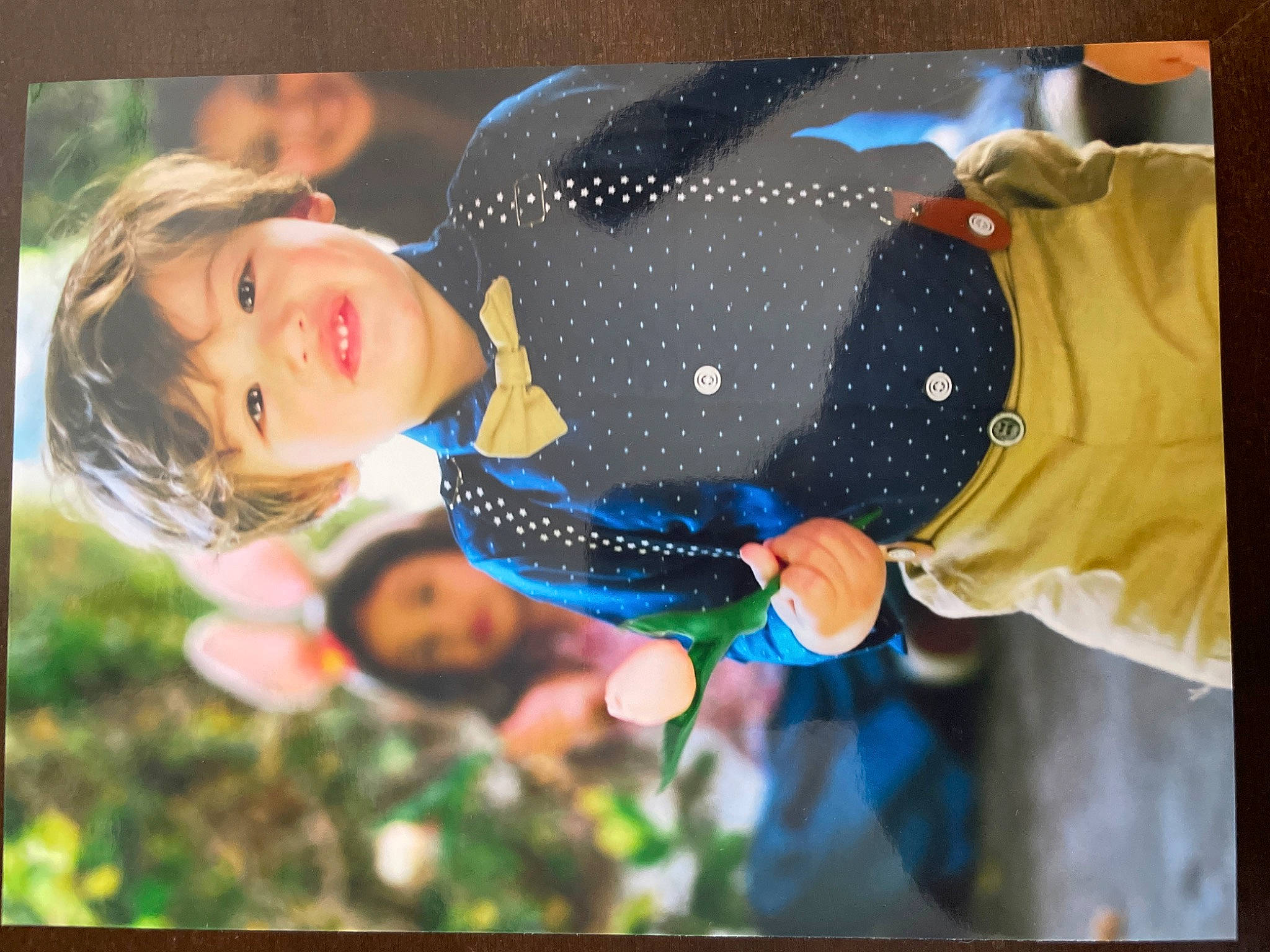 Tobias is registered to the contest to win money with this photo: blurred, child, electric_blue, event, flash_photography, formal_wear, fun, gesture, grass, happy, joy, leisure, pattern, people_in_nature, person, portrait_photography, recreation, smile, toddler