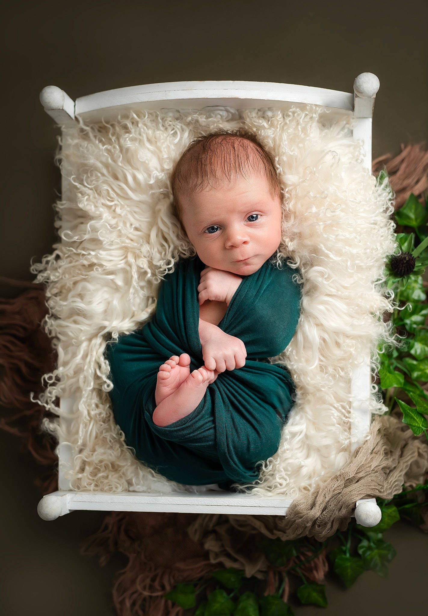 Charlie is registered to the contest to win money with this photo: baby, baby_products, baby_toddler_clothing, child, christmas, christmas_decoration, christmas_eve, event, flash_photography, fur, grass, happy, holiday, home_accessories, interior_design, jewellery, person, portrait_photography, sitting, toddler