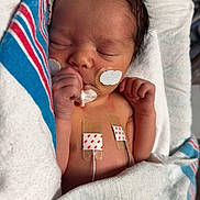 Messiah joined the competition — help win amazing prizes! newborn, baby, sleeping, hospital, medical, blanket, sensor, face, hand, skin, infant, cute, healthcare, small, peaceful, resting, child, wrapped, patient, bed