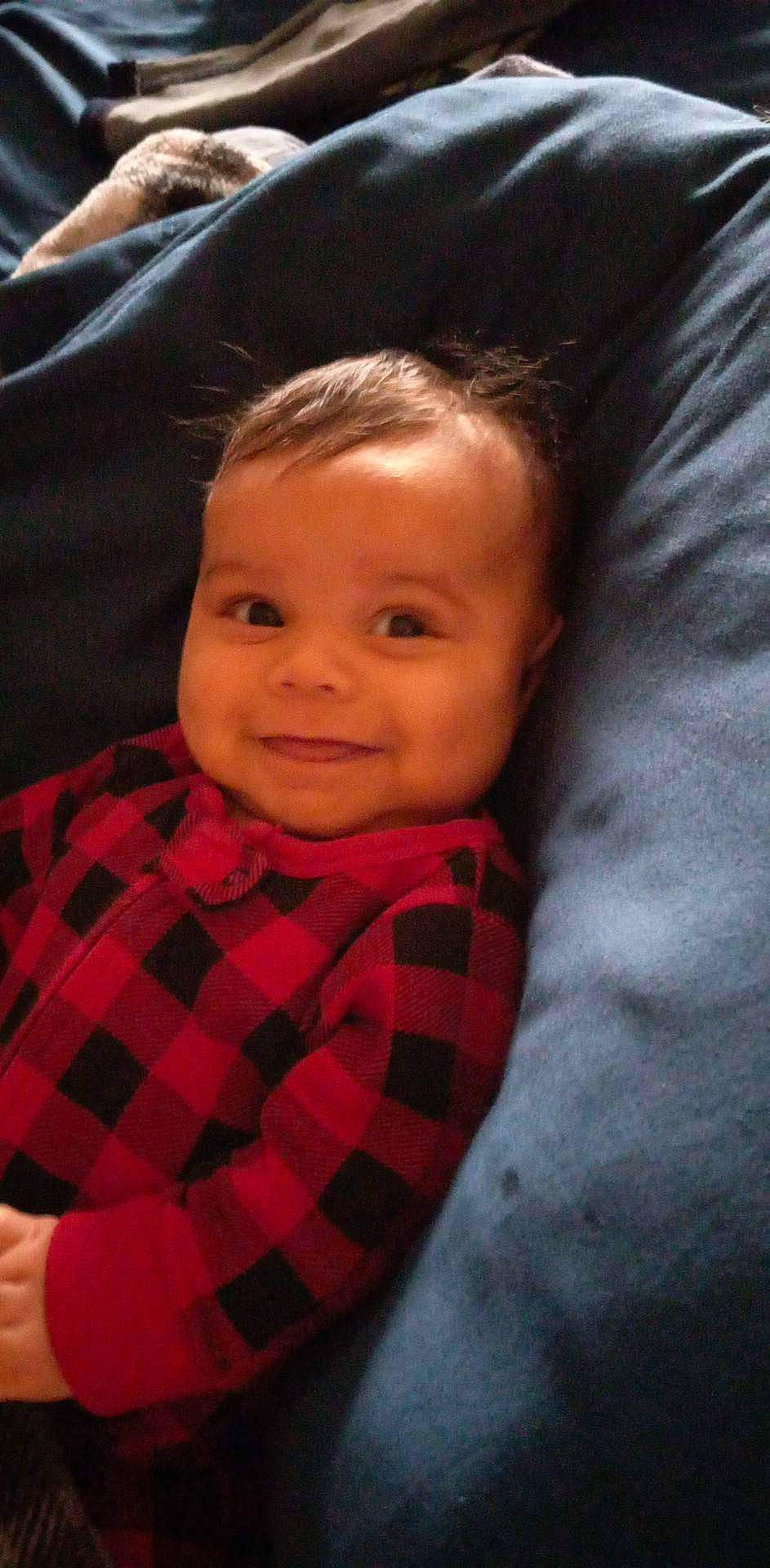 Micah joined the competition — help win amazing prizes! cheek, chin, comfort, eye, eyebrow, forehead, hairstyle, human_body, iris, joy, lip, mouth, neck, nose, person, plaid, skin, sleeve, smile, tartan