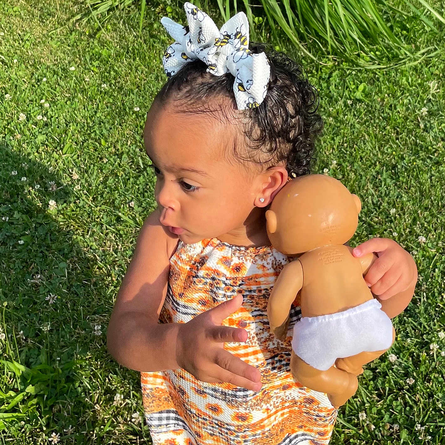 Zoey joined the competition — help win amazing prizes! abdomen, baby, baby_toddler_clothing, botany, child, eye, grass, grass_family, happy, headband, headpiece, lawn, meadow, people_in_nature, plant, skin, summer, toddler, tree, trunk