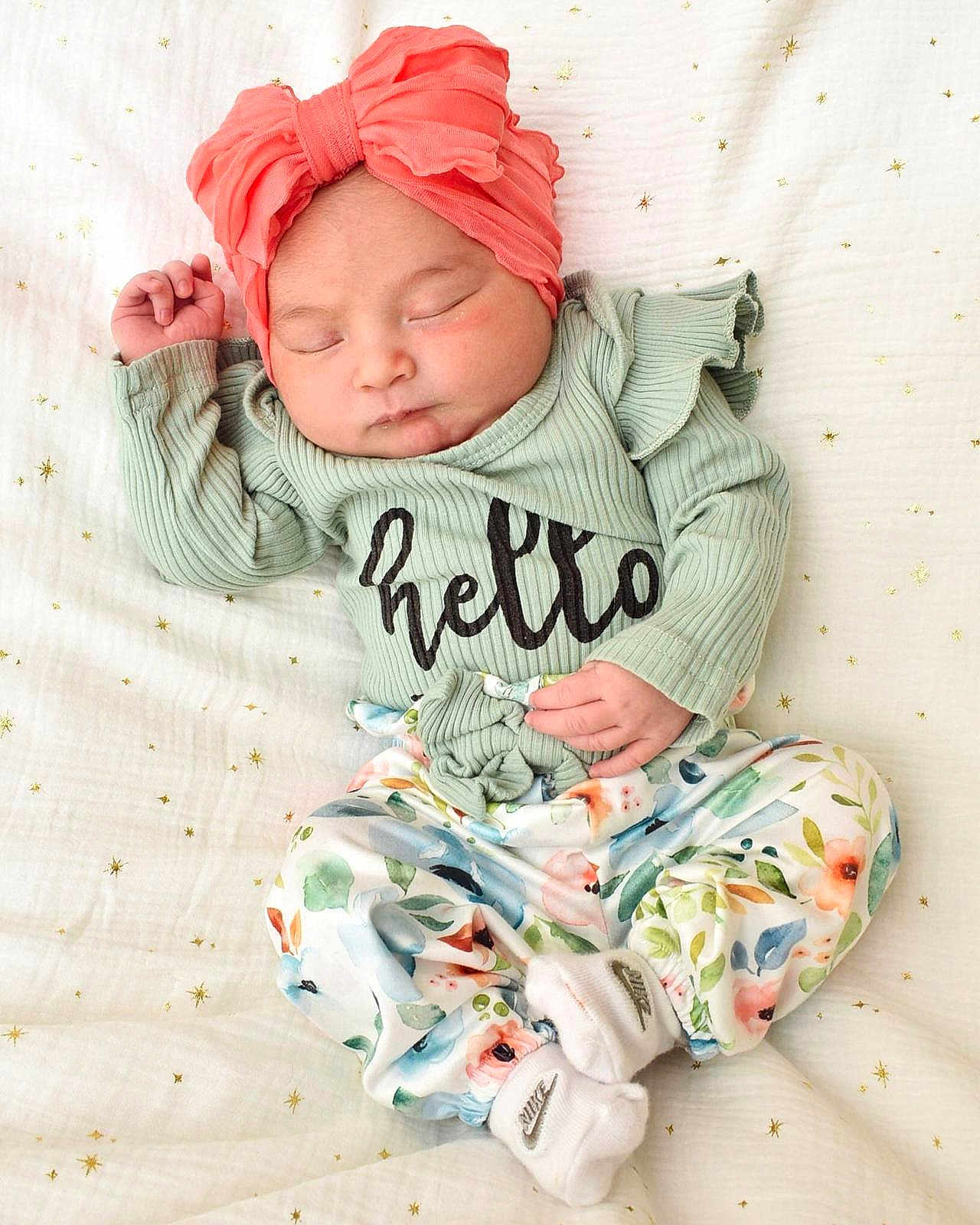 Samara Rose Becerra is registered to the contest to win money with this photo: baby, sleeping, headwrap, coral, mint_green, floral_pants, white_blanket, golden_stars, newborn, cute, peaceful, clothing, infant, soft, portrait, child, resting, cozy, small, adorable