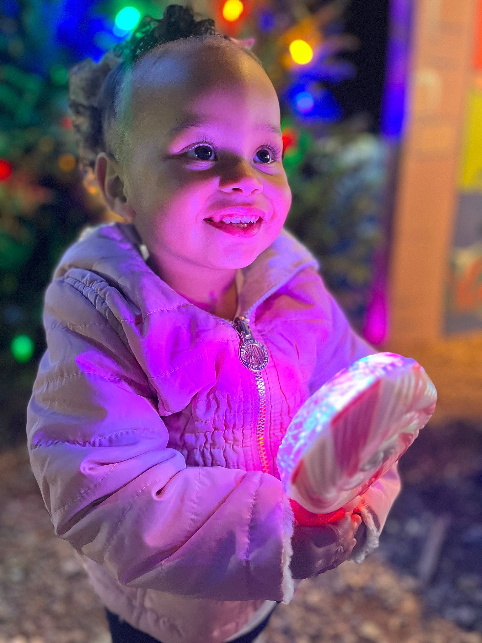 Anylah joined the competition — help win amazing prizes! baby_toddler_clothing, child, christmas_ornament, electric_blue, event, face, fun, grass, happy, holiday, iris, joy, magenta, people_in_nature, person, pink, plant, purple, sitting, smile