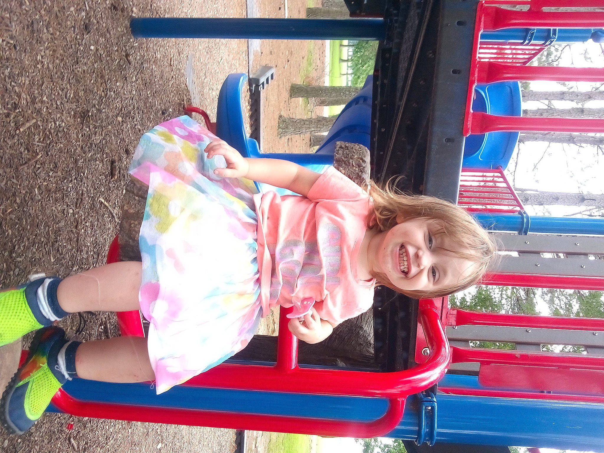 Jadex is registered to the contest to win money with this photo: baby_toddler_clothing, blue, child, city, clothing, electric_blue, fun, happy, human_leg, joy, leisure, motor_vehicle, person, pink, recreation, red, smile, sock, street_fashion, summer