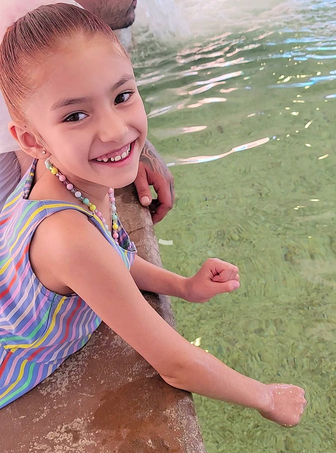 Zarii is registered to the contest to win money with this photo: beach, child, fun, grass, happy, human_body, joy, leisure, ocean, people_in_nature, people_on_beach, person, play, recreation, sand, sitting, smile, soil, t_shirt, toddler