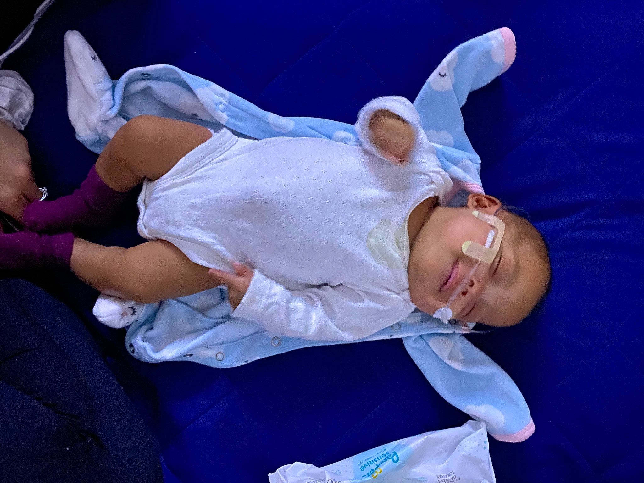 Kataleya is registered to the contest to win money with this photo: abdomen, arm, baby, child, comfort, costume, elbow, electric_blue, entertainment, event, fun, gesture, happy, hat, lap, leisure, performing_arts, person, sitting, smile