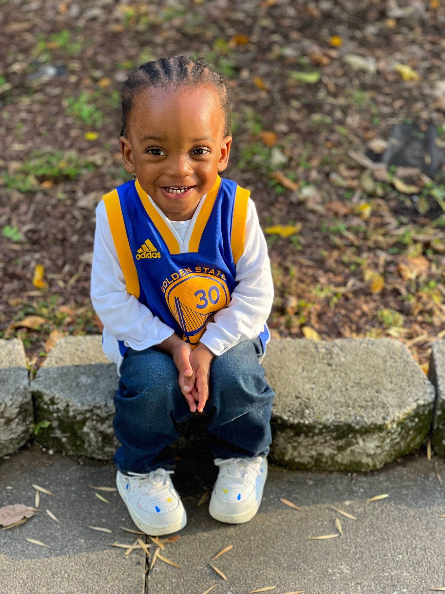 Kolby is registered to the contest to win money with this photo: baby_toddler_clothing, child, clothing, electric_blue, eye, fun, grass, happy, head, joy, leaf, leisure, mammal, people_in_nature, person, plant, smile, sneakers, t_shirt, toddler