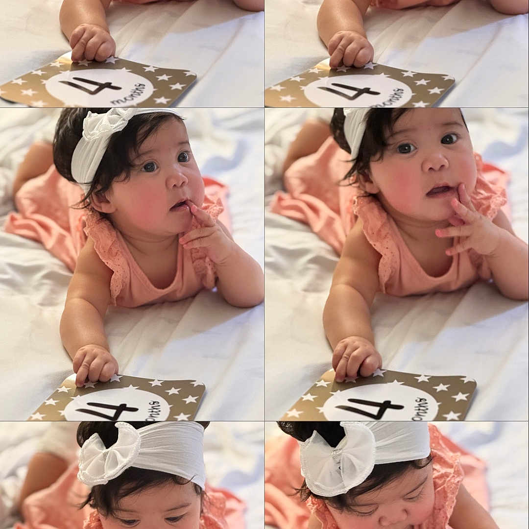 Vilorie is registered to the contest to win money with this photo: 4_months, baby, baby_girl, bed, child, chubby_cheeks, close_up, collage, curious, cute, fingers, hands, indoors, infant, lying_down, milestone_card, peach_clothing, portrait, soft_light, white_headband