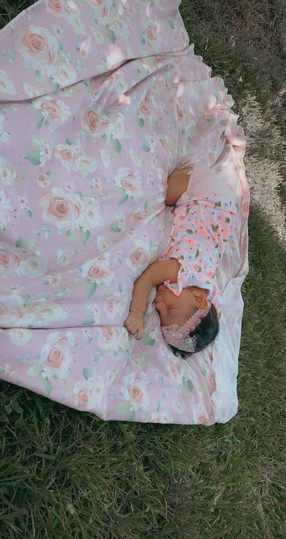 Leticia joined the competition — help win amazing prizes! baby, baby_products, baby_toddler_clothing, bedding, child, comfort, dress, fashion_accessory, grass, hand, linens, pattern, peach, person, pink, sitting, sleeve, t_shirt, toddler
