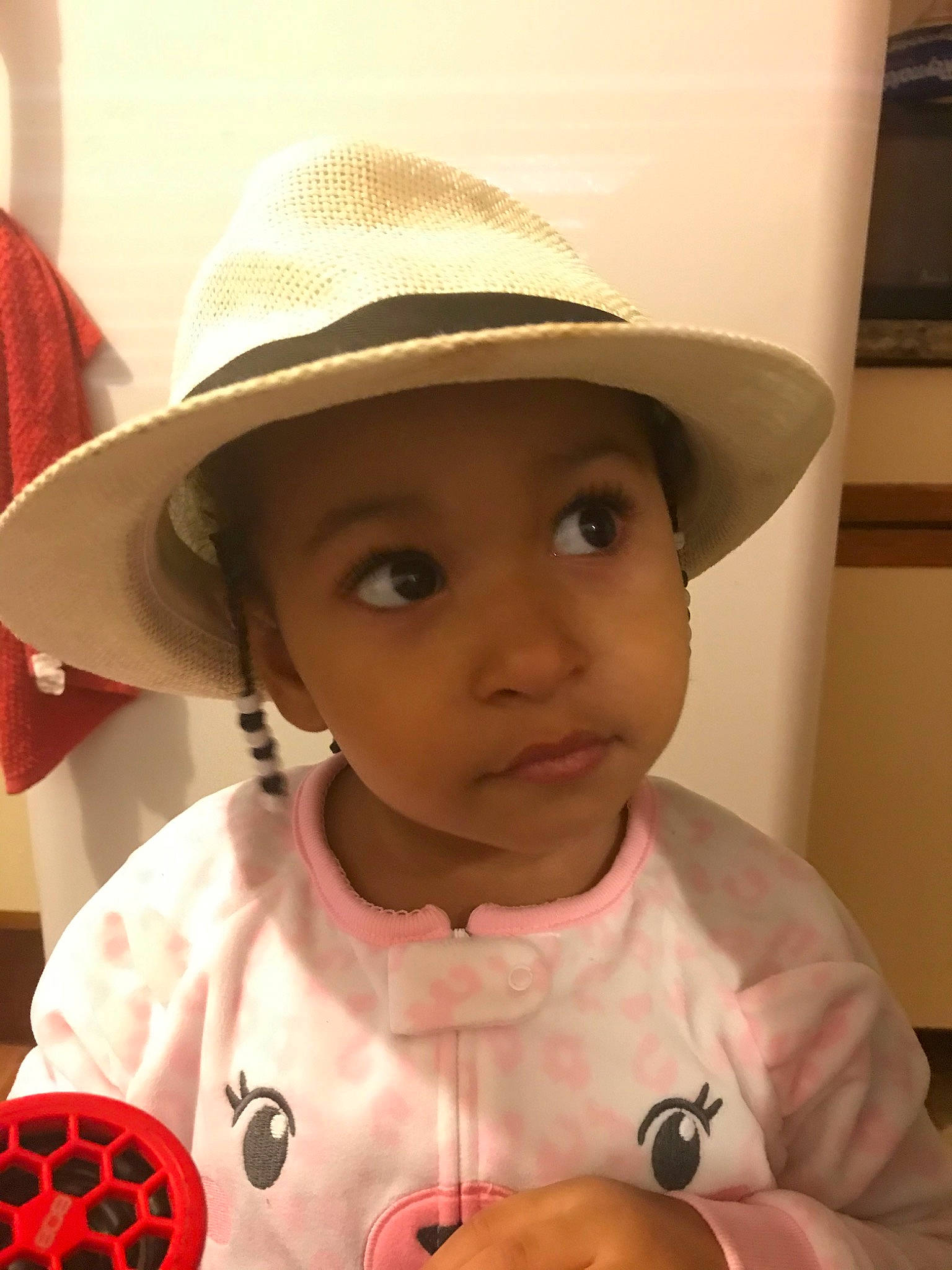 Egypt is registered to the contest to win money with this photo: baby, child, fashion_accessory, hat, headgear, headwear, person, sun_hat, toddler