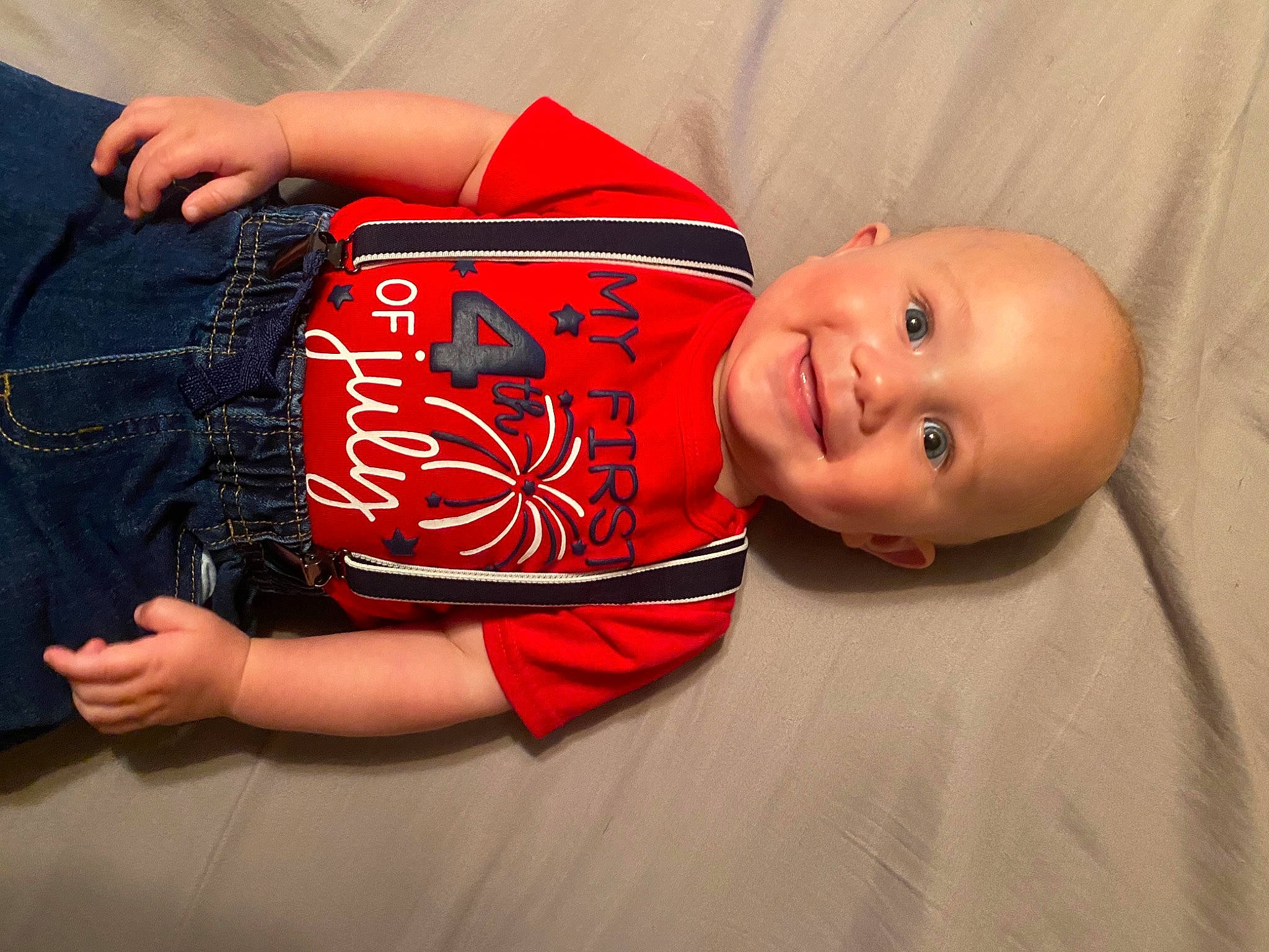 Graysen is registered to the contest to win money with this photo: baby, baby_toddler_clothing, comfort, eye, finger, flash_photography, hand, happy, human_body, jeans, joy, knee, leg, lip, mouth, neck, person, skin, sleeve, smile