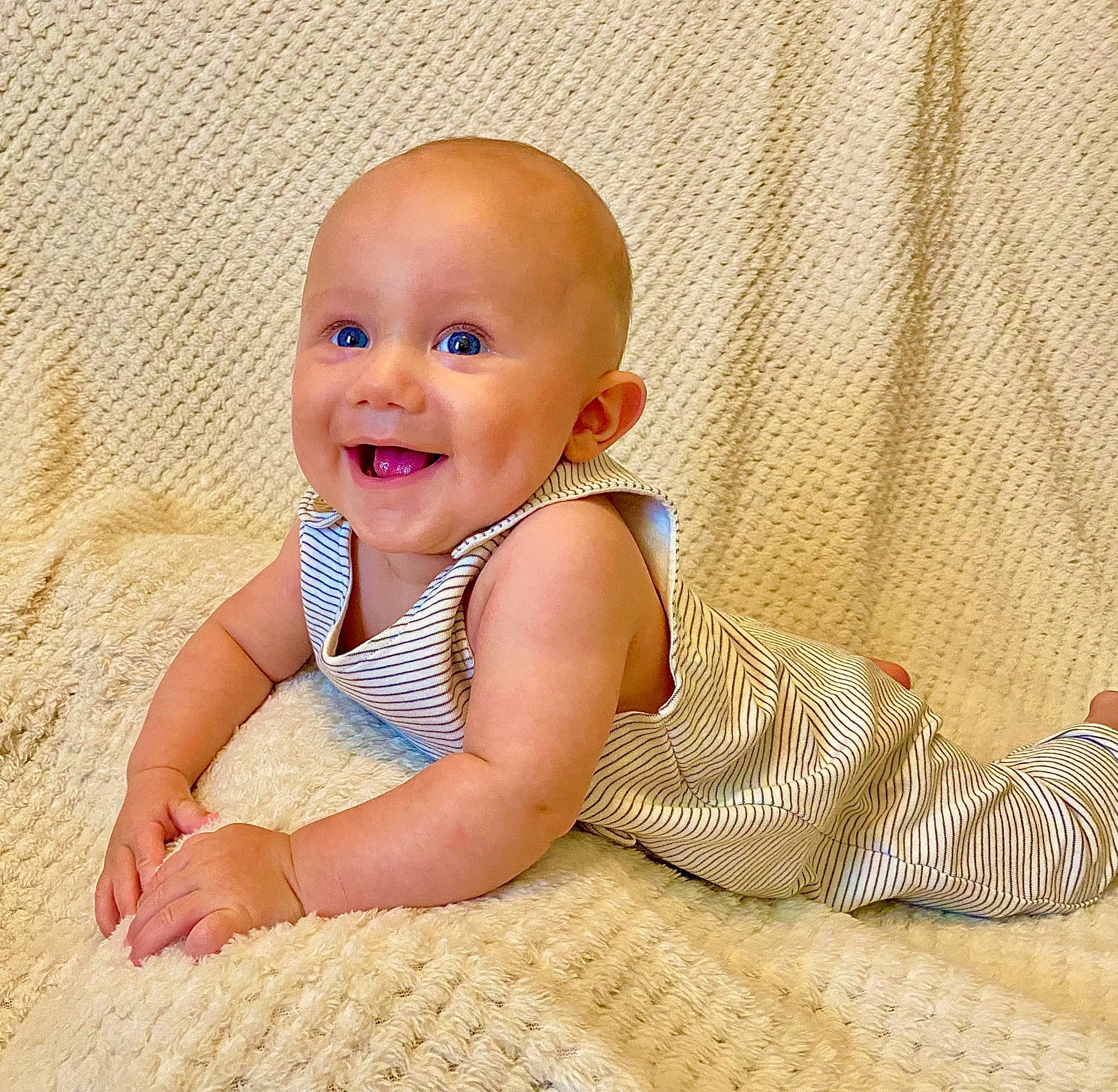 Graysen joined the competition — help win amazing prizes! baby, baby_crawling, baby_toddler_clothing, cheek, child, comfort, face, finger, floor, flooring, happy, human_leg, pattern, people_in_nature, person, skin, sleeve, smile, thumb, toddler