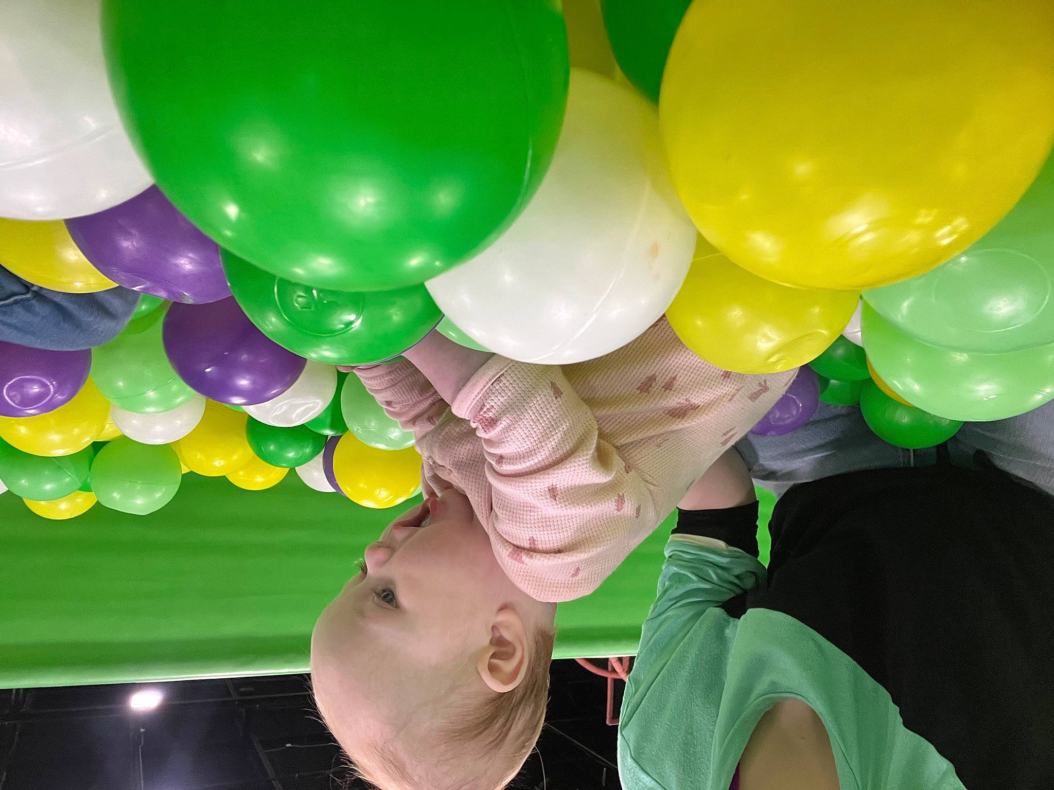 Julianne is registered to the contest to win money with this photo: arch, balloon, circle, decoration, event, fun, happy, inflatable, leisure, light, magenta, party, party_supply, person, pink, recreation, white, yellow