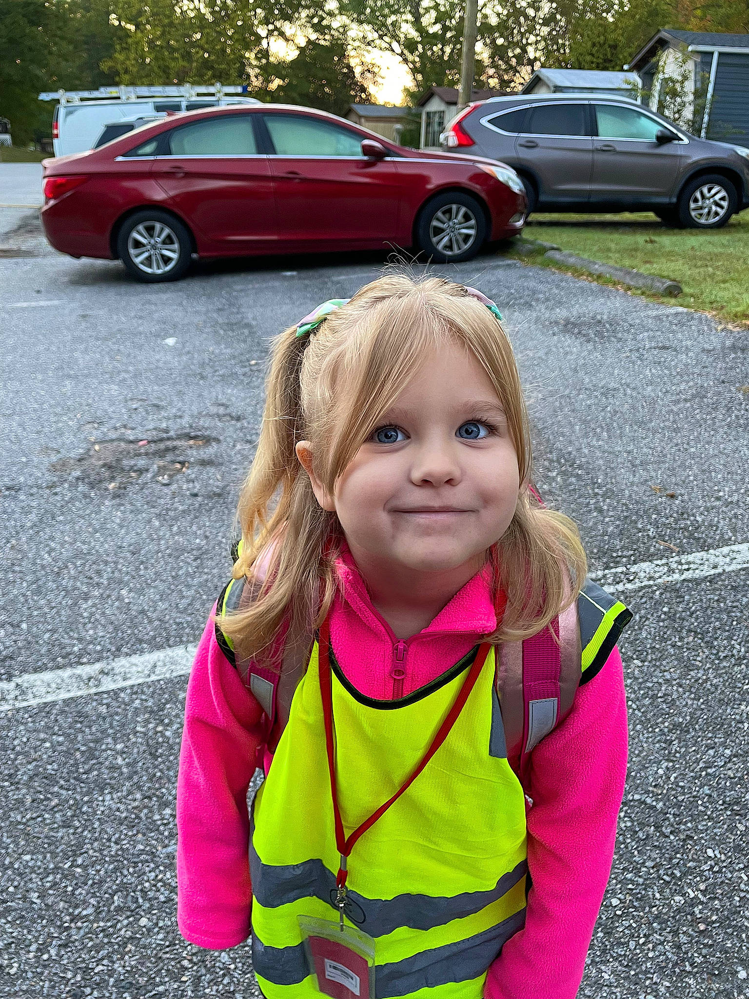 April joined the competition — help win amazing prizes! asphalt, automotive_design, automotive_exterior, automotive_lighting, automotive_tire, car, happy, joy, land_vehicle, motor_vehicle, person, personal_luxury_car, personal_protective_equipment, public_space, road_surface, smile, snapshot, tire, toddler, vehicle