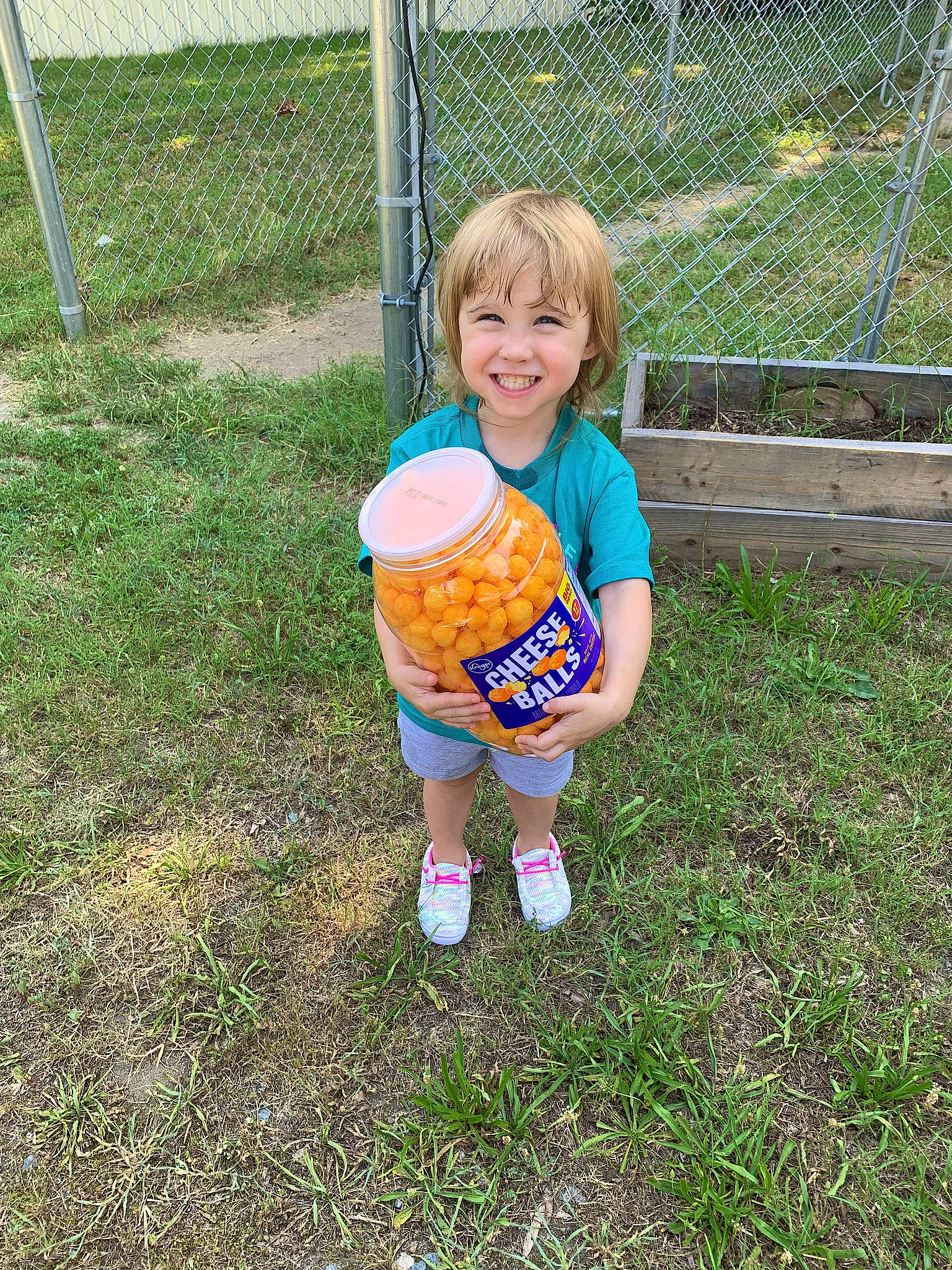 Aurora joined the competition — help win amazing prizes! baby, baby_toddler_clothing, ball, bottle, child, drink, fence, fun, grass, happy, human_leg, joy, leisure, mesh, people_in_nature, person, play, shorts, smile, soil
