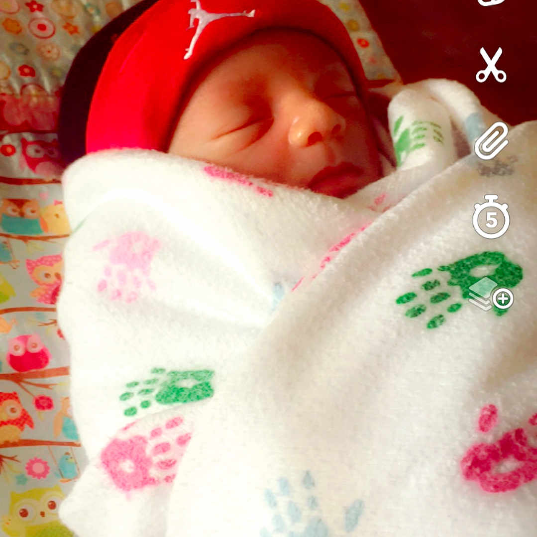 Harlem is registered to the contest to win money with this photo: cheek, child, doll, girl, infant, lip, petal, pink, product, red, skin, sweetness, textile, toddler, toy