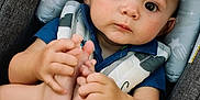 Teddy joined the competition — help win amazing prizes! baby, blue_shirt, car_seat, child, comfort, cute, expression, eyes, face, feet, hands, head_support, indoor, infant, person, portrait, seatbelt, skin, striped_shorts, young_child