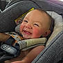 baby, baby_face, candid, car_interior, car_seat, child, child_safety, childhood, closeup, cute, happy, indoors, infant, portrait, rosy_cheeks, safety_harness, seat_headrest, seatbelt, smiling, toddler