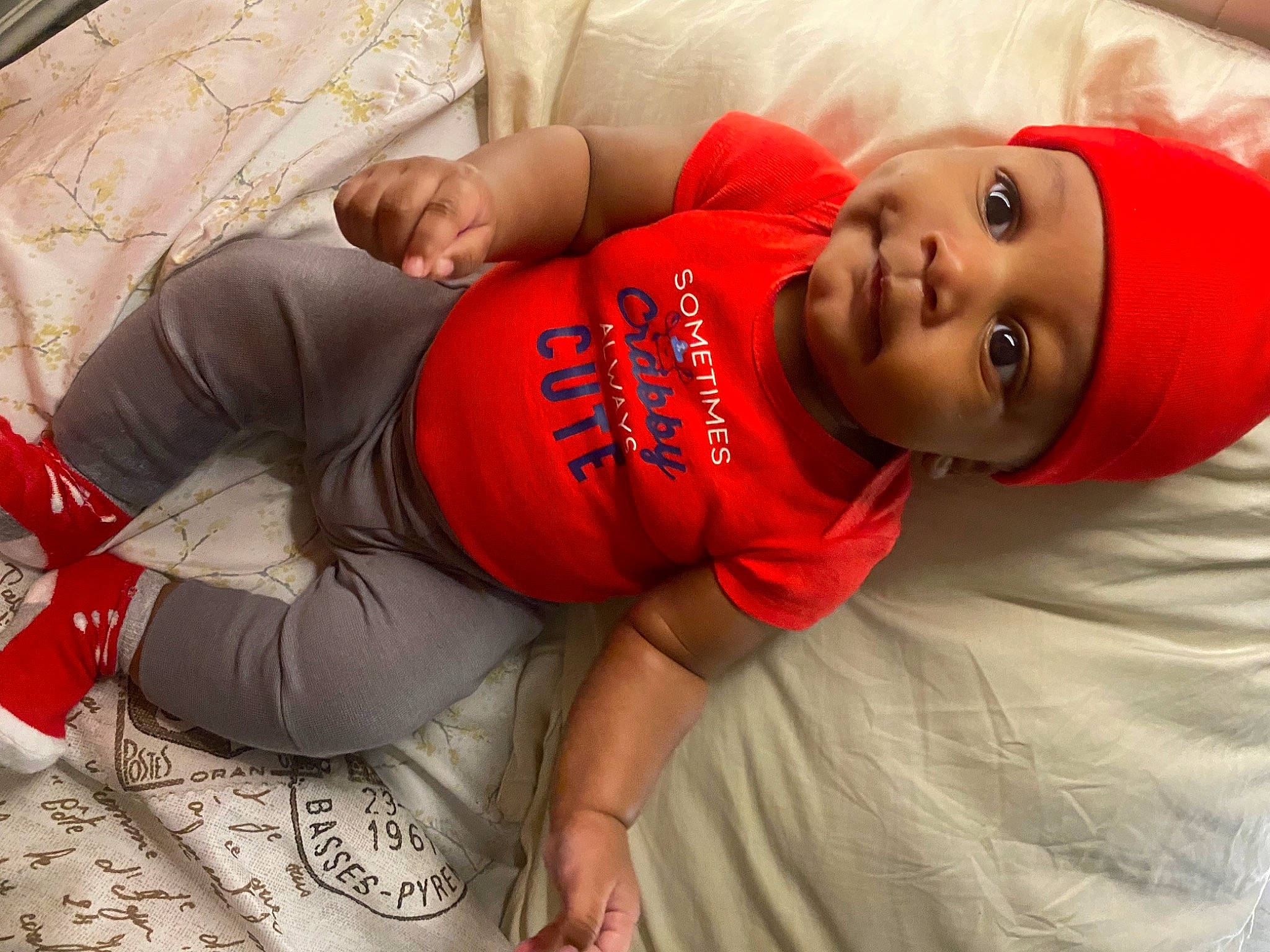 Moziah joined the competition — help win amazing prizes! comfort, elbow, facial_expression, fashion, flash_photography, flooring, fun, happy, headwear, human_leg, joint, knee, leg, mouth, orange, person, red, sleeve, smile, t_shirt