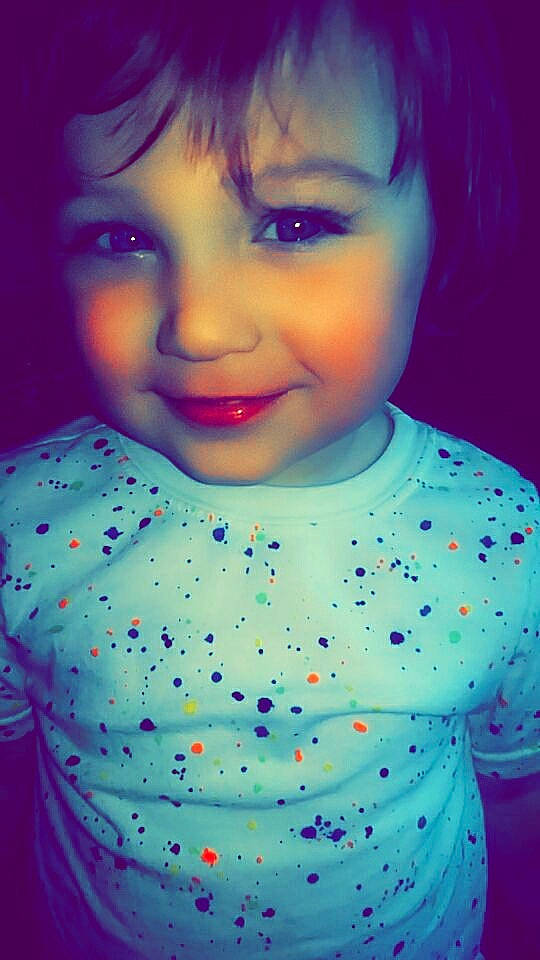 Dalton is registered to the contest to win money with this photo: baby, blue, cheek, child, chin, close_up, eye, face, forehead, fun, head, lip, mouth, nose, person, pink, purple, skin, smile, toddler