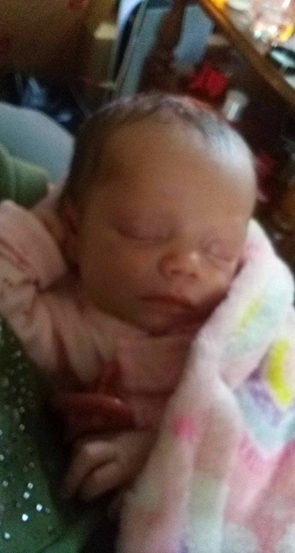 Raylynn is registered to the contest to win money with this photo: baby, baby_toddler_clothing, cheek, chest, child, comfort, ear, eyebrow, eyelash, flesh, forehead, head, mouth, nail, nose, person, skin, temperature, thumb, toddler