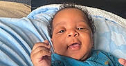 Sincere joined the competition — help win amazing prizes! baby, infant, smiling, blue_outfit, blanket, hand, face, curly_hair, happy, indoors, bed, pillow, cute, child, person, portrait, cozy, soft, young, relaxed