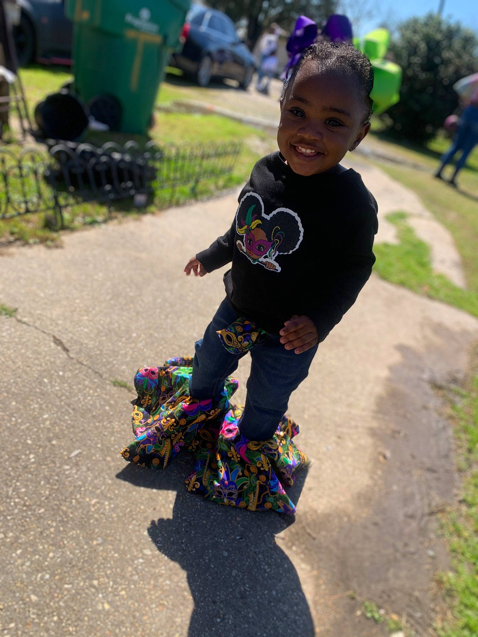 Jariyah is registered to the contest to win money with this photo: asphalt, baby, blue, child, fun, grass, green, happy, joy, leaf, leisure, people_in_nature, person, plant, public_space, recreation, sleeve, smile, tire, toddler