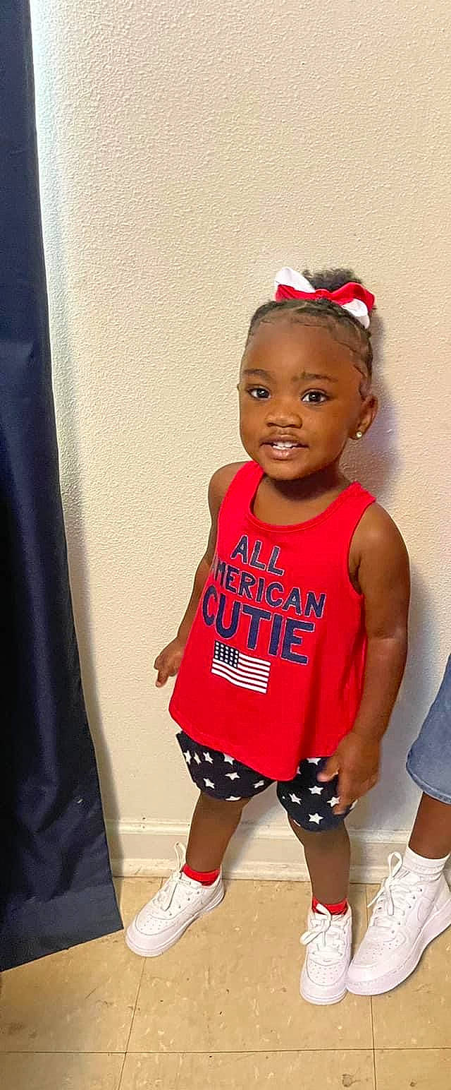 Jariyah joined the competition — help win amazing prizes! baby_toddler_clothing, child, fashion_accessory, fashion_design, fun, happy, head, jersey, magenta, person, shoe, shorts, sleeve, sleeveless_shirt, smile, sneakers, sportswear, t_shirt, thigh, toddler