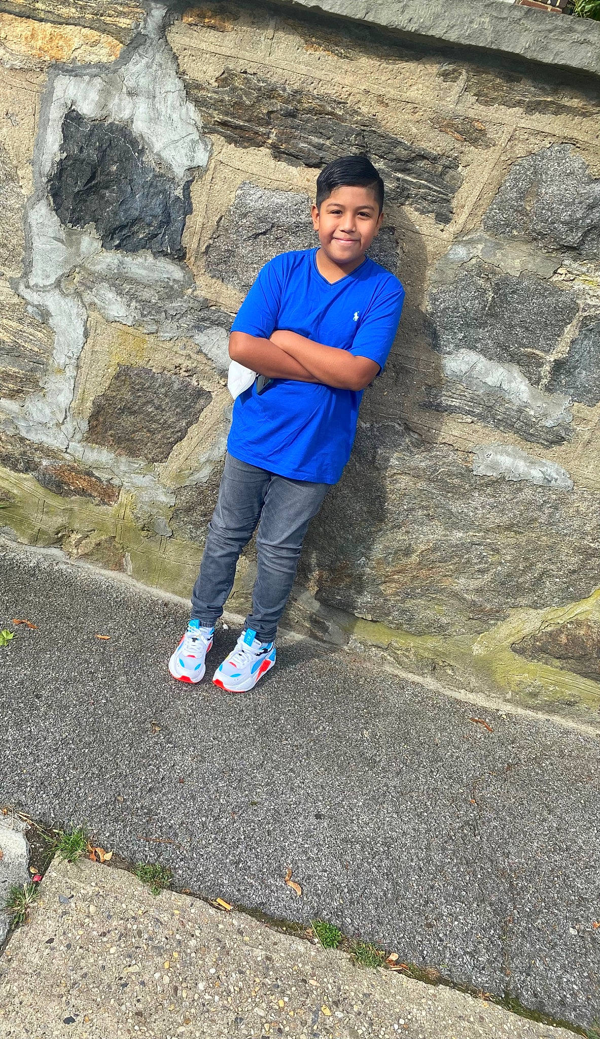 Josh joined the competition — help win amazing prizes! asphalt, child, concrete, denim, electric_blue, fun, grass, human_leg, joy, landscape, leisure, person, recreation, road, road_surface, rock, shadow, sitting, soil, stone_wall