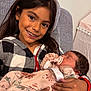 Kendra joined the competition — help win amazing prizes! baby, braces, casual, child, couch, cozy, family, floral_clothing, happy, holding, home, indoor, newborn, pacifier, portrait, relaxed, sibling, sleeping, smiling, young_girl