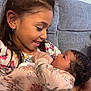 Kendra is registered to the contest to win money with this photo: affection, baby, child, closeup, couch, cute, family, girl, happy, holding, home, indoor, infant, love, newborn, people, portrait, sitting, smiling, tender