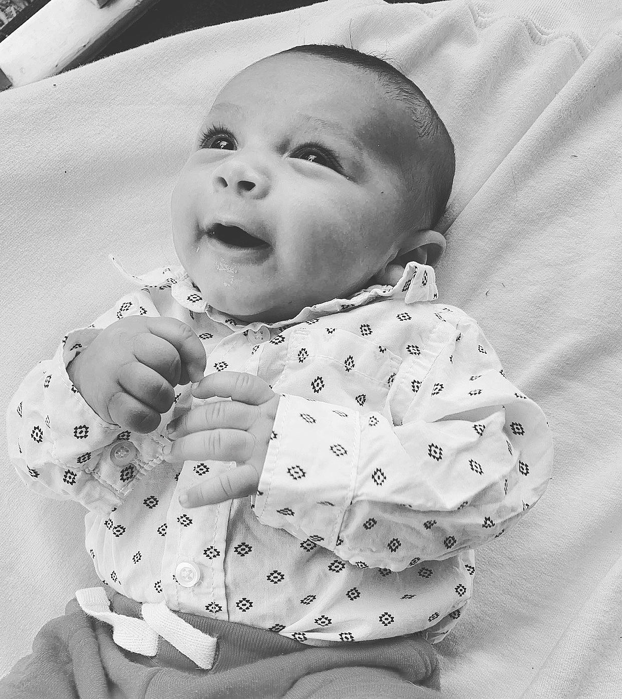 Kendryck is registered to the contest to win money with this photo: baby, baby_toddler_clothing, black_and_white, cheek, child, monochrome, monochrome_photography, pattern, person, photograph, photography, product, smile, style, toddler, white