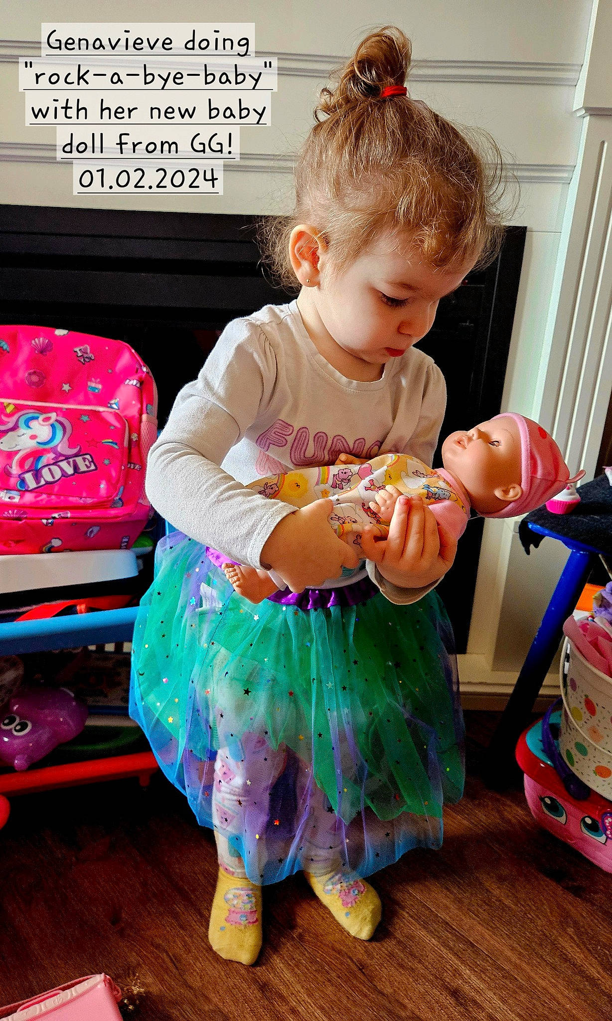 Genavieve is registered to the contest to win money with this photo: baby, baby_products, baby_toddler_clothing, child, dress, fashion_accessory, fun, hairstyle, happy, magenta, pattern, person, pink, play, sitting, sleeve, sock, t_shirt, toddler, toy