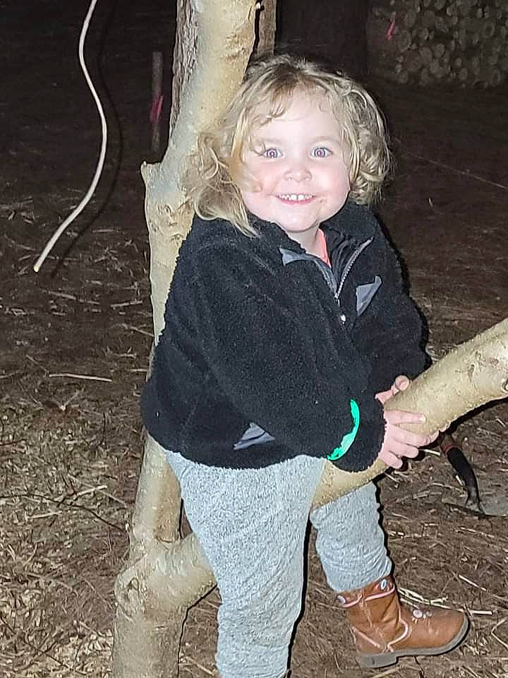 Evie joined the competition — help win amazing prizes! arm, blond, chair, child, flash_photography, fun, grass, hair, hand, happy, joy, leg, people_in_nature, person, sitting, sleeve, smile, soil, t_shirt, toddler