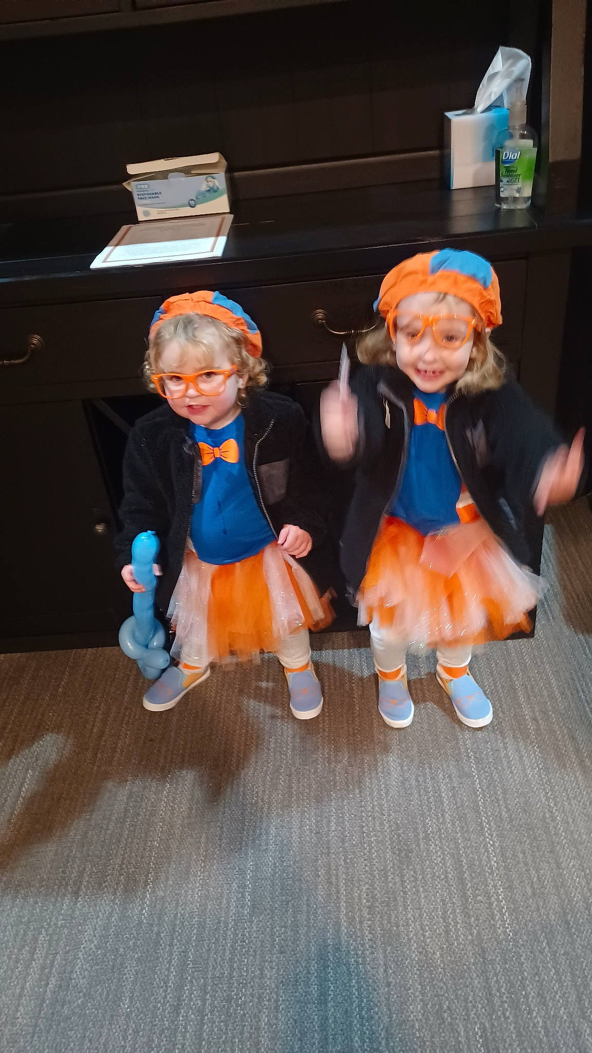 Evie joined the competition — help win amazing prizes! animation, art, child, costume, doll, event, fawn, fictional_character, figurine, flooring, fun, fur, hat, headwear, joy, orange, person, room, sitting, tail