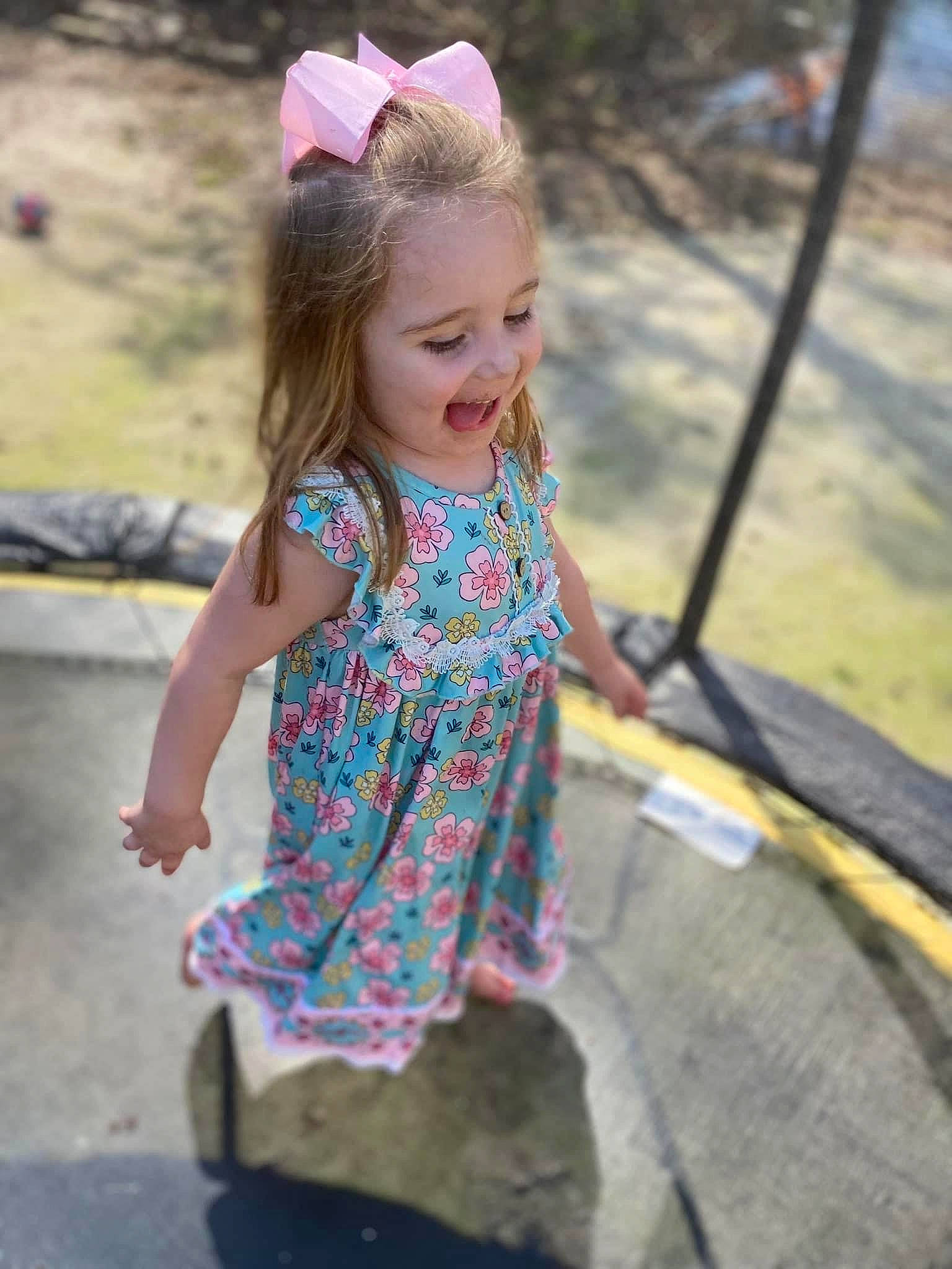 Annalynn joined the competition — help win amazing prizes! asphalt, child, cool, dress, facial_expression, fun, grass, hair, happy, head, human, joy, leaf, leisure, magenta, person, pink, recreation, road_surface, smile