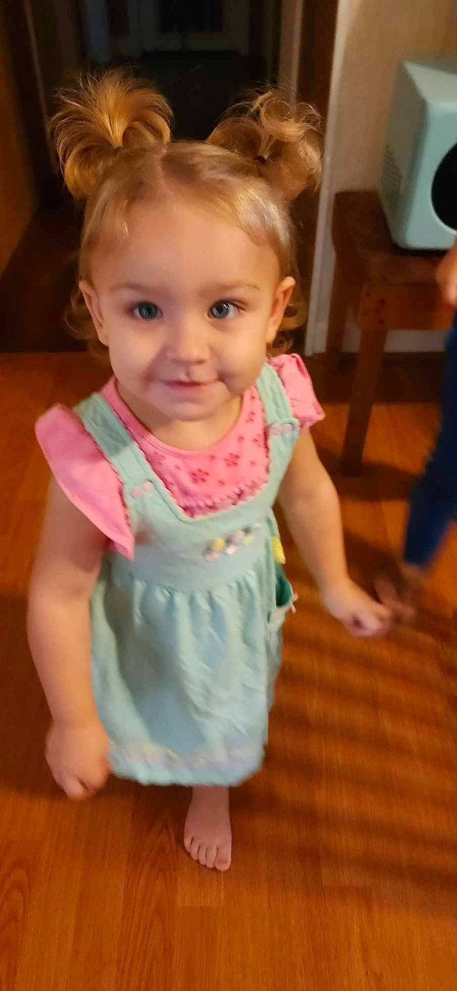 Alayah is registered to the contest to win money with this photo: baby, baby_toddler_clothing, cheek, child, dress, eyelash, face, flooring, gesture, hair, hand, happy, iris, joy, lip, neck, nose, person, pink, skin