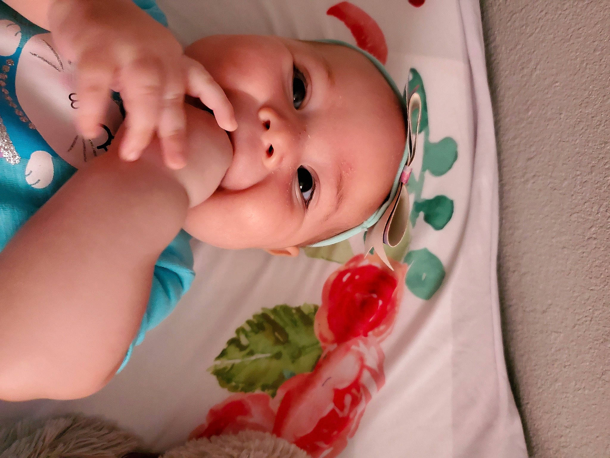 Briar is registered to the contest to win money with this photo: baby, cheek, child, eye, face, finger, hand, head, headwear, lip, mouth, nose, person, skin, smile, toddler