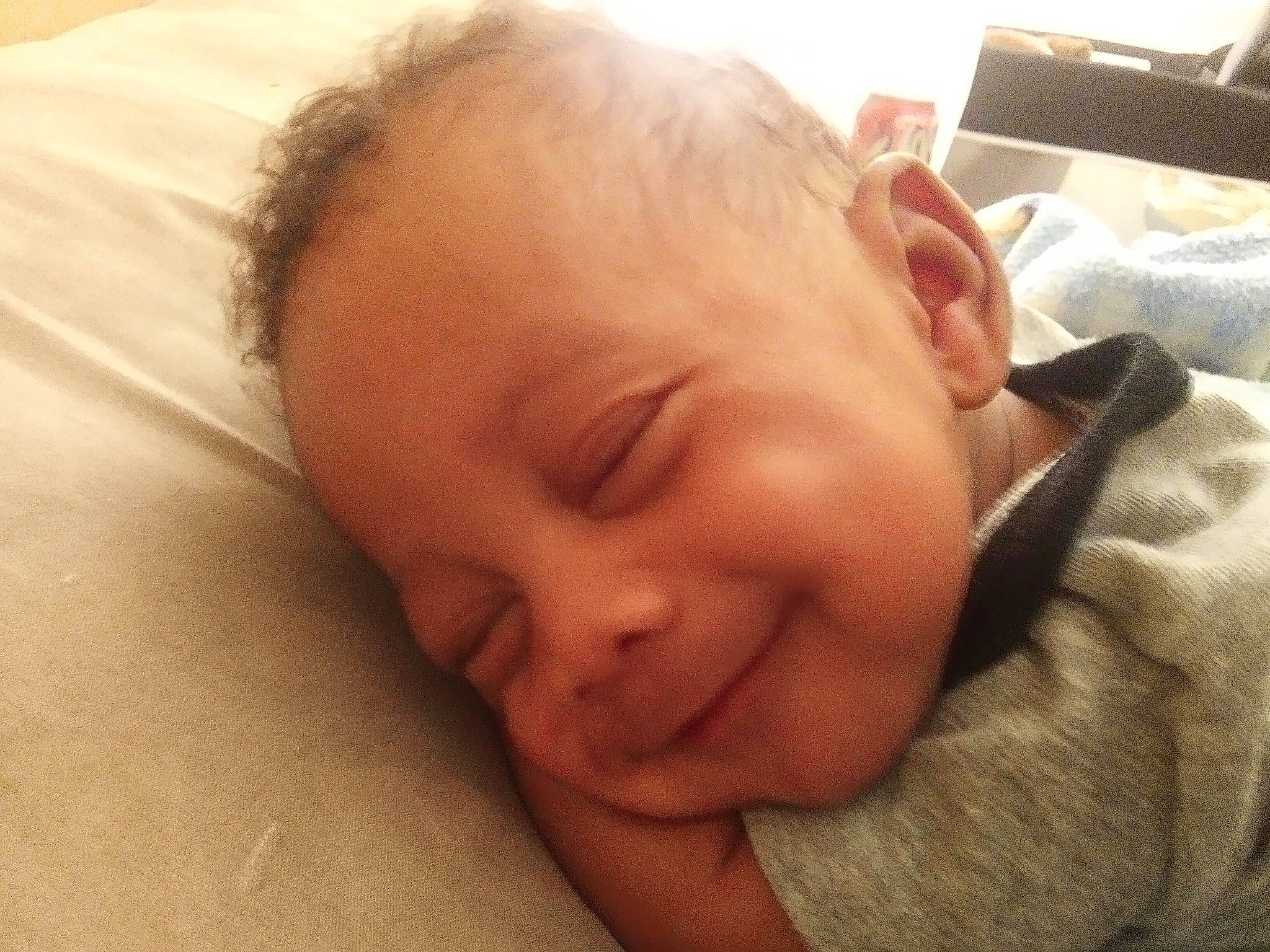 Nylon joined the competition — help win amazing prizes! baby, baby_making_funny_faces, baby_toddler_clothing, bed, bedtime, cheek, child, comfort, ear, eyelash, happy, joy, laugh, linens, nap, nose, person, portrait_photography, smile, thumb