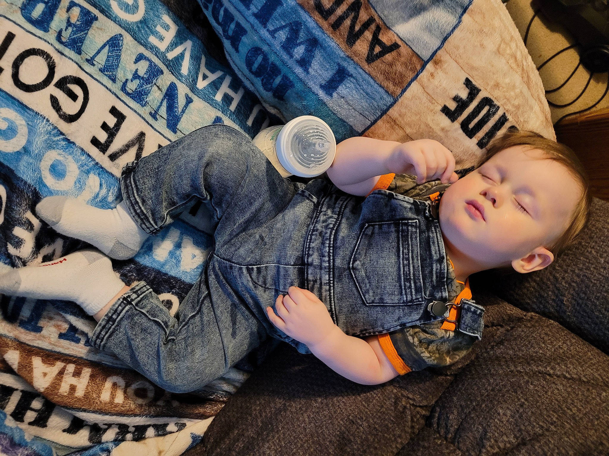 Alastor joined the competition — help win amazing prizes! arm, baby, bag, comfort, cool, denim, flash_photography, font, fun, gesture, hand, human_body, human_leg, leg, pattern, person, sitting, street, t_shirt, thigh