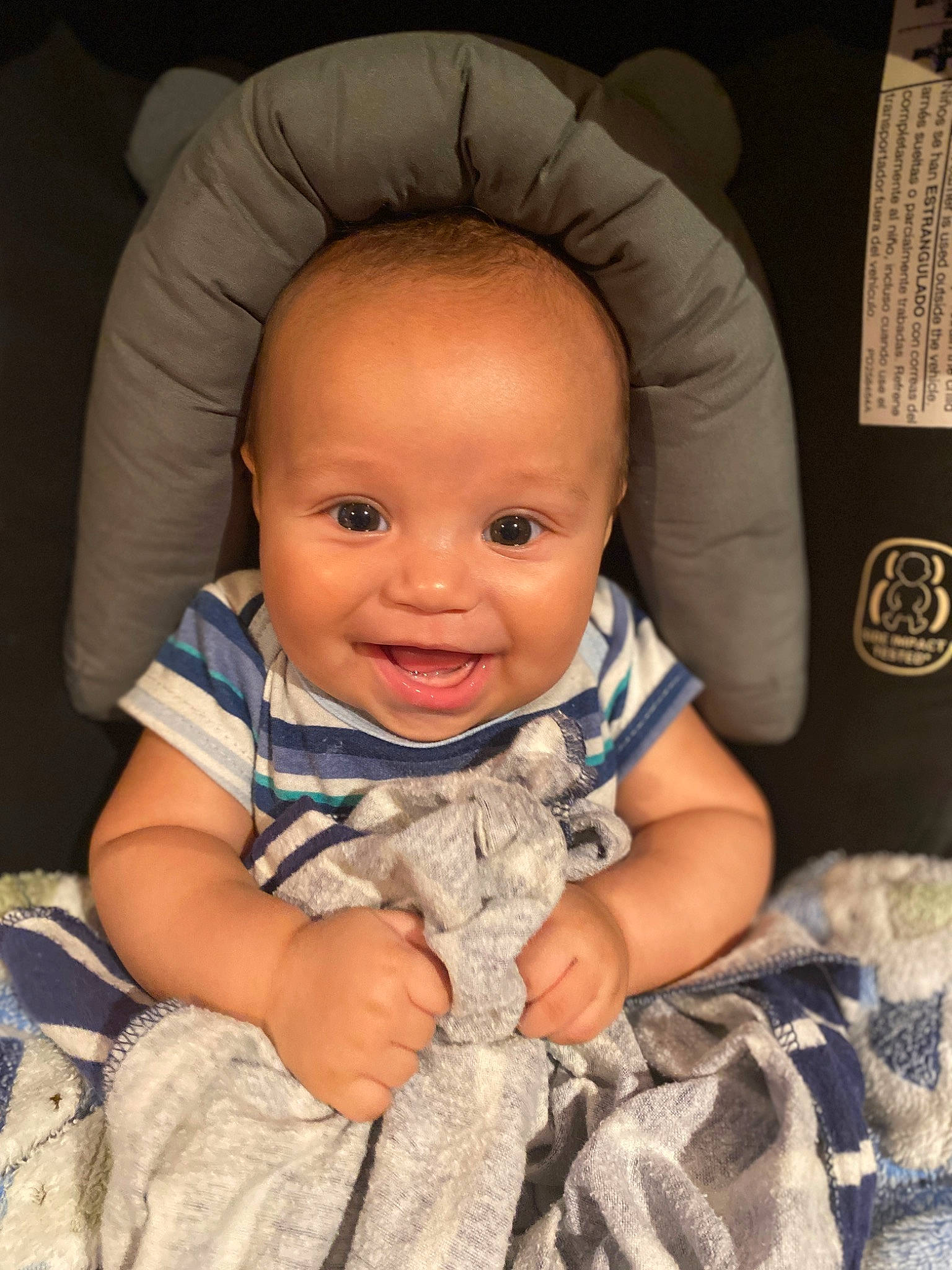 Legend is registered to the contest to win money with this photo: arm, baby, baby_toddler_clothing, cheek, chin, comfort, eye, eyebrow, face, flash_photography, happy, head, human_body, iris, lip, mouth, nose, person, skin, sleeve