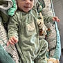 baby, infant, onesie, mint_green, fox_patch, soft_toy, teddy_bear, baby_nest, blanket, sea_animals, cute, smiling, indoors, child, cozy, lying_down, plush, comfort, patterned, person