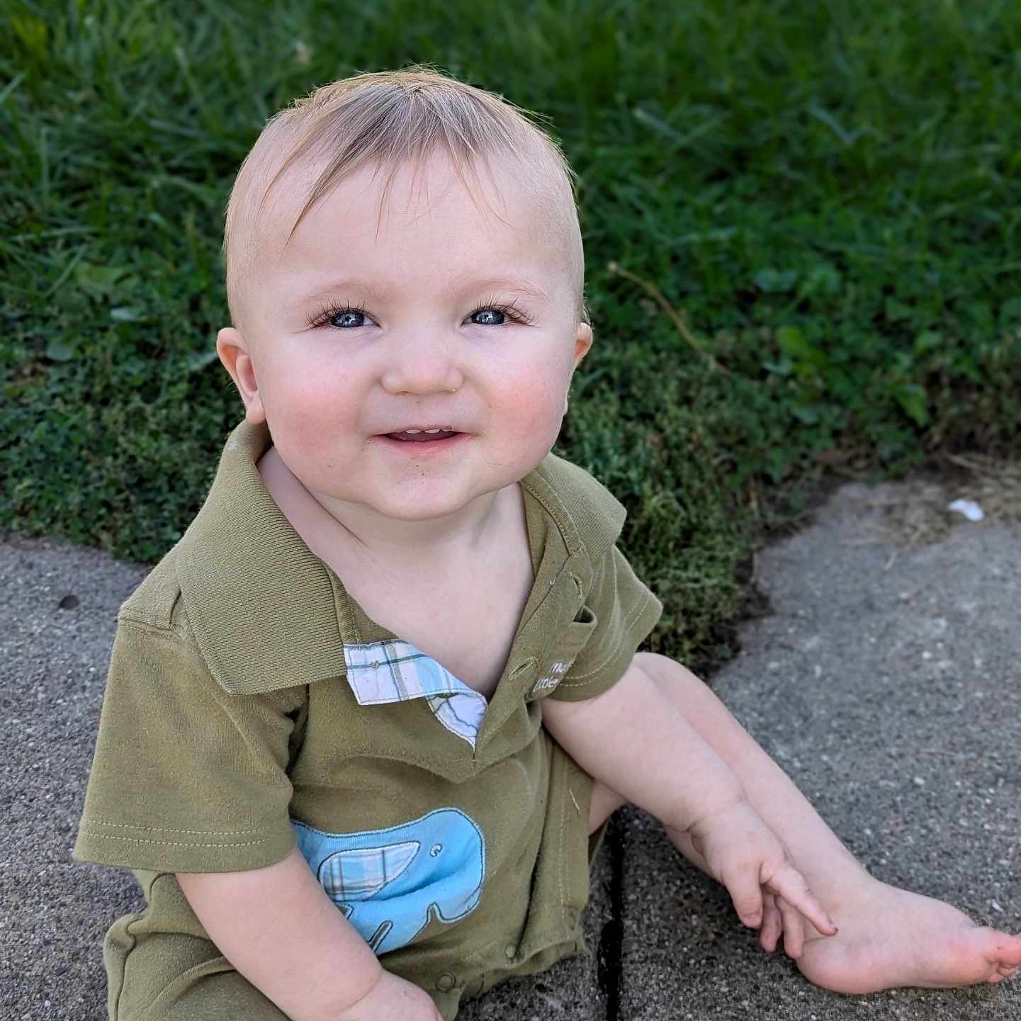 Floki joined the competition — help win amazing prizes! baby, barefoot, blonde, bodypart, clothing, crawling, dress, face, finger, grass, hand, head, lawn, pants, person, photography, plant, portrait, shorts, sitting