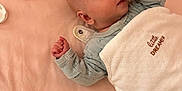 Lyse participe au concours pour gagner de l'argent avec cette photo : baby, sleeping, blanket, pajamas, crib, soft, peaceful, infant, child, resting, cute, cozy, fabric, bed, pink, white, blue, newborn, portrait, indoor