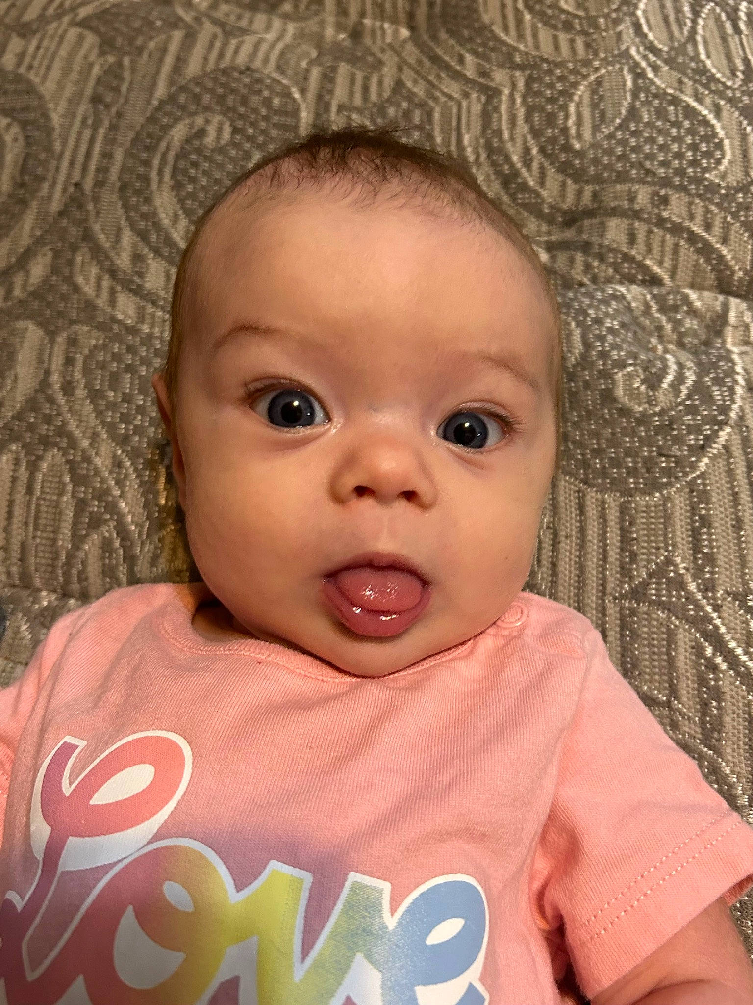 Phoenix joined the competition — help win amazing prizes! baby, baby_toddler_clothing, cheek, chin, eye, eyebrow, eyelash, facial_expression, forehead, hairstyle, iris, lip, mammal, mouth, nose, person, pink, skin, sleeve, smile