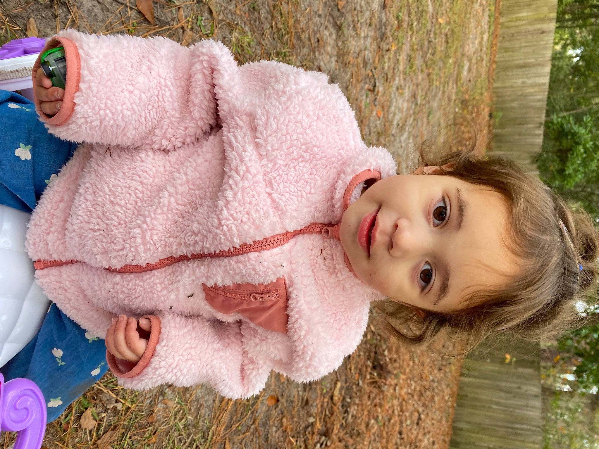 Tahlia joined the competition — help win amazing prizes! baby, baby_toddler_clothing, child, face, fashion_accessory, grass, head, headgear, knit_cap, lip, nose, pattern, people, person, pink, plant, skin, toddler, tree, wood