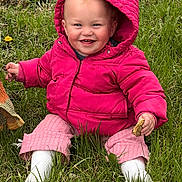 Georgia joined the competition — help win amazing prizes! baby, child, clothing, cute, dandelions, grass, grass_field, greenery, happy, hood, infant, nature, outdoor, person, pink_jacket, playful, portrait, sitting, smile, sunlight