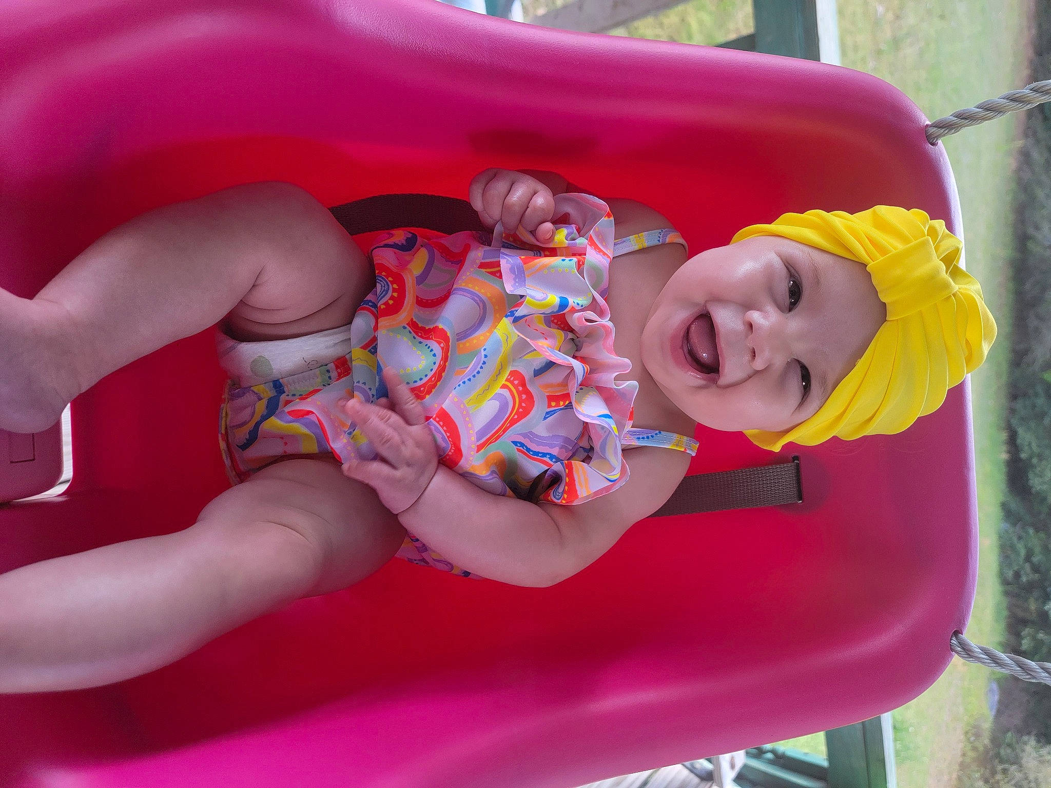 Lorelei is registered to the contest to win money with this photo: baby, baby_laughing, baby_products, baby_toddler_clothing, chest, child, fun, happy, headwear, human_body, human_leg, leisure, magenta, mouth, person, pink, recreation, red, skin, smile