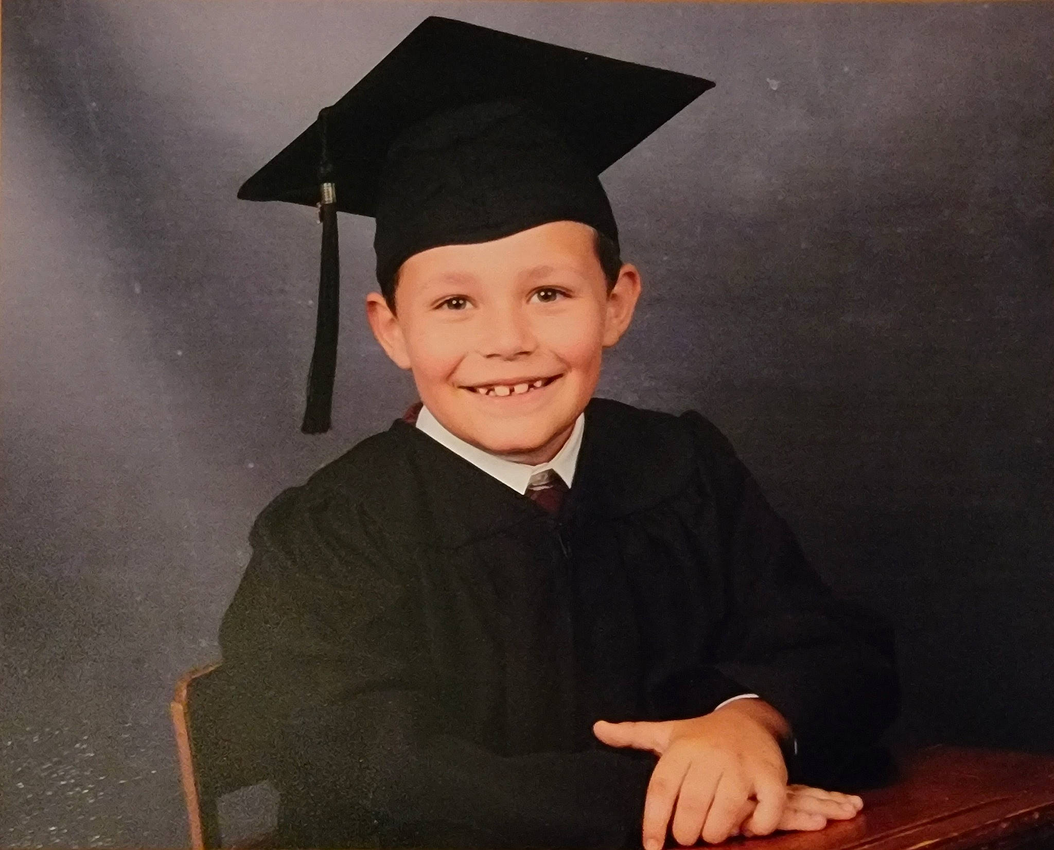 Jonah joined the competition — help win amazing prizes! academic_dress, academic_institution, event, eye, face, formal_wear, gesture, graduation, happy, head, headgear, headwear, jazz_pianist, joy, keyboard, mortarboard, musical_instrument, musical_keyboard, person, phd