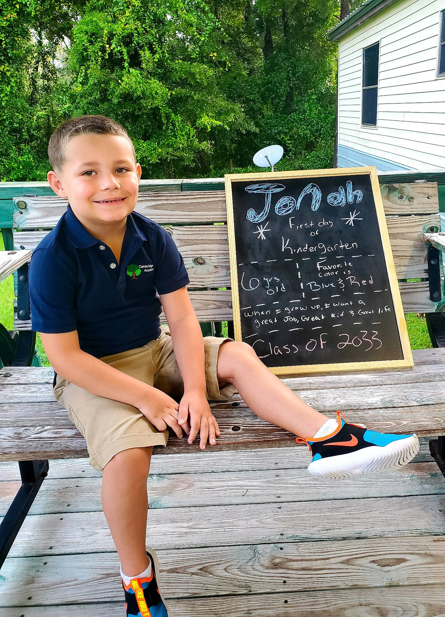 Jonah joined the competition — help win amazing prizes! blackboard, chalk, electric_blue, fun, grass, green, handwriting, happy, joy, leisure, morning, person, plant, recreation, sandal, shorts, smile, street_fashion, t_shirt, thigh